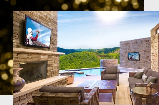 Outdoor living space with a TV
