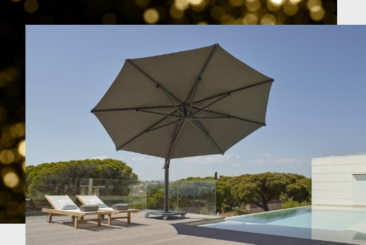 An Umbrella by a pool.