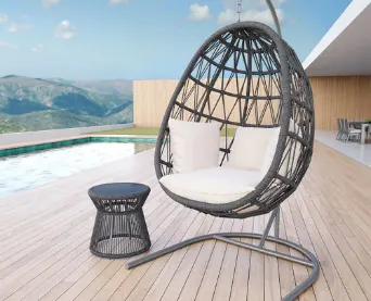 A hammock hanging from a hook stand.