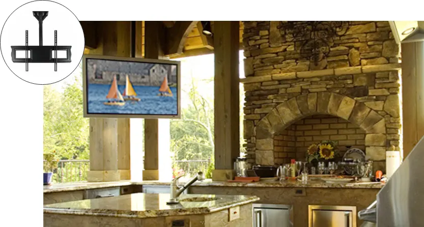 A TV hanging from the ceiling mount in an outdoor kitchen.