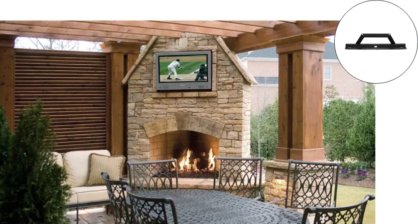 A TV on top of a hole made at the top of a fireplace.