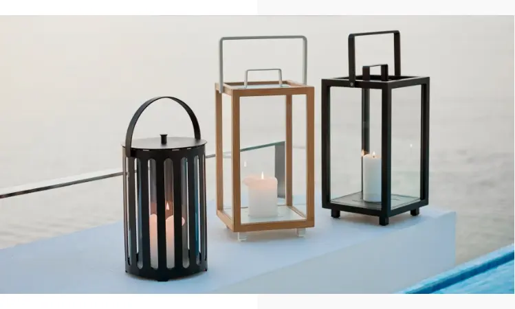Various lanterns with lit candles inside.