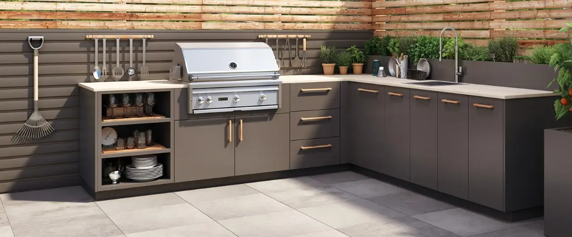 An outdoor kitchen with a built-in grill.