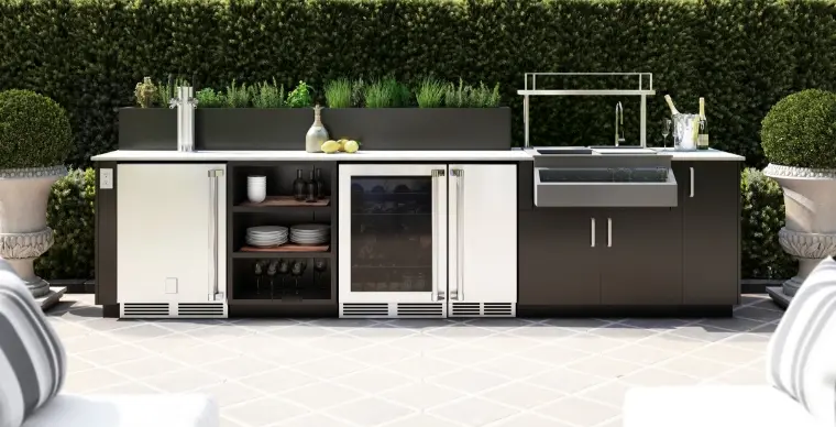 An outdoor kitchen with a built-in grill.