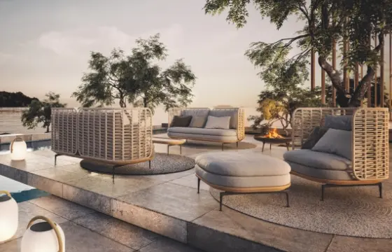 A sitting area by a pool.