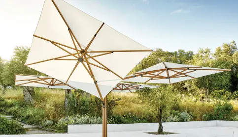 An umbrella that has four canopies.