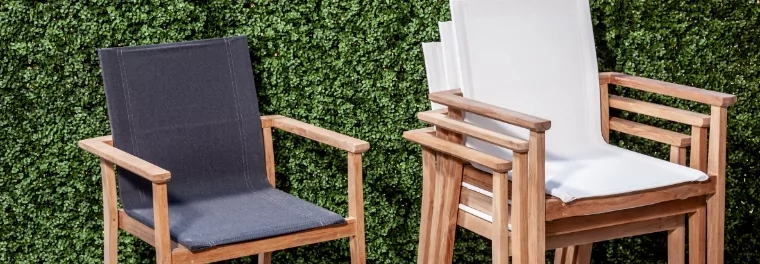 Various chairs stacked on each other.