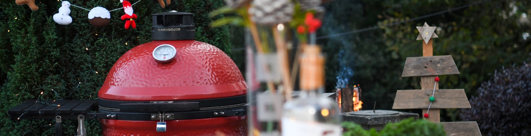 Red Kamado Joe Grill in a patio