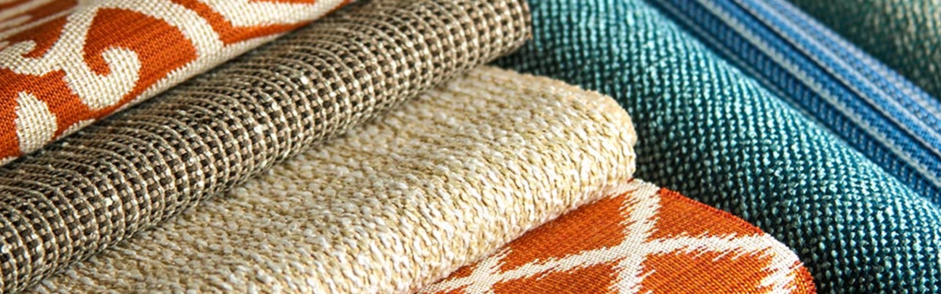 Various outdoor rugs with different colors and patterns